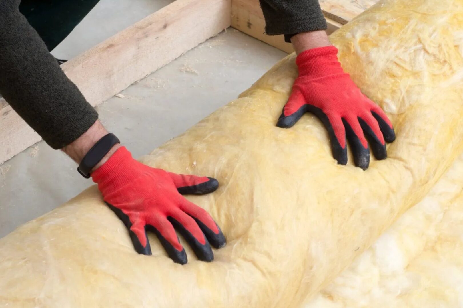 Person wearing red color gloves